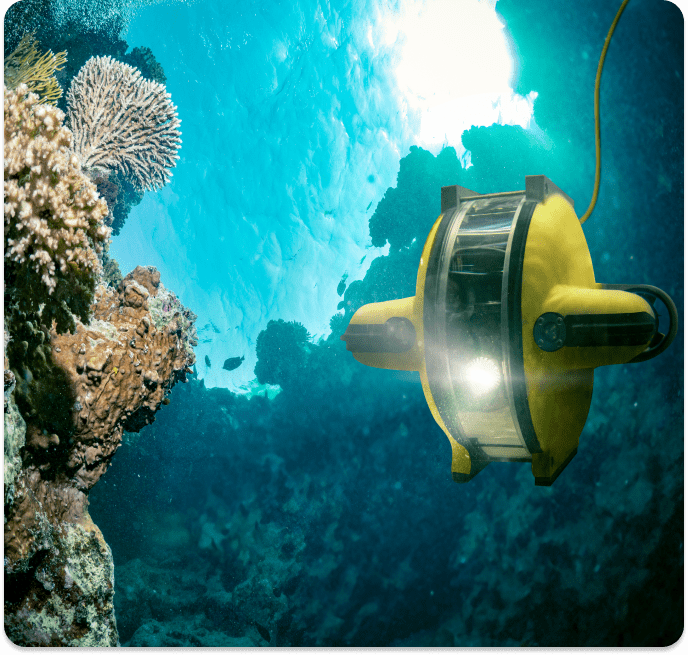 Yellow underwater drone exploring coral reef.