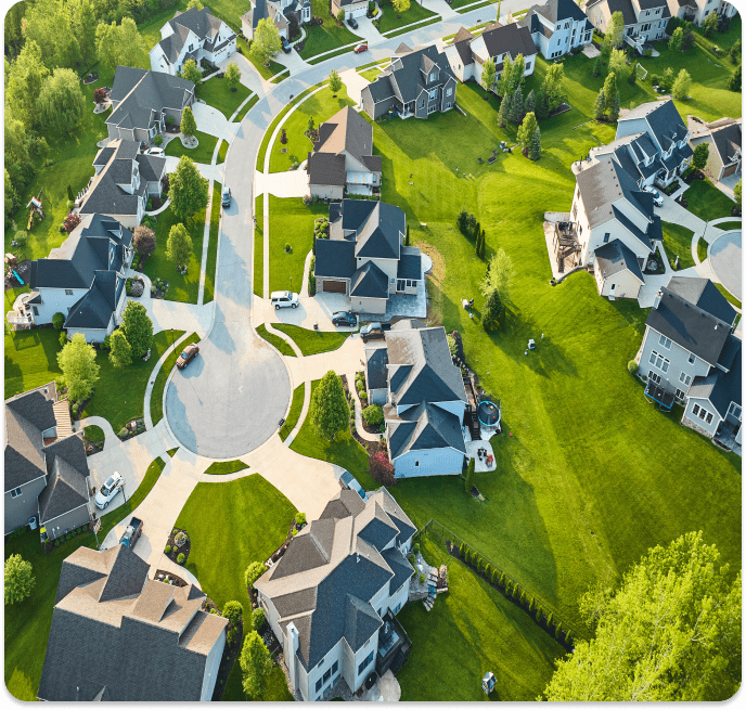 Aerial view of upscale suburban homes.